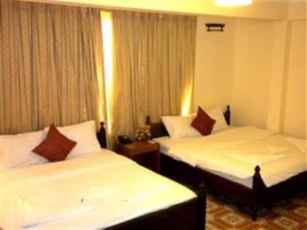 فندق Rendezvous بنوم بنه الغرفة الصورة