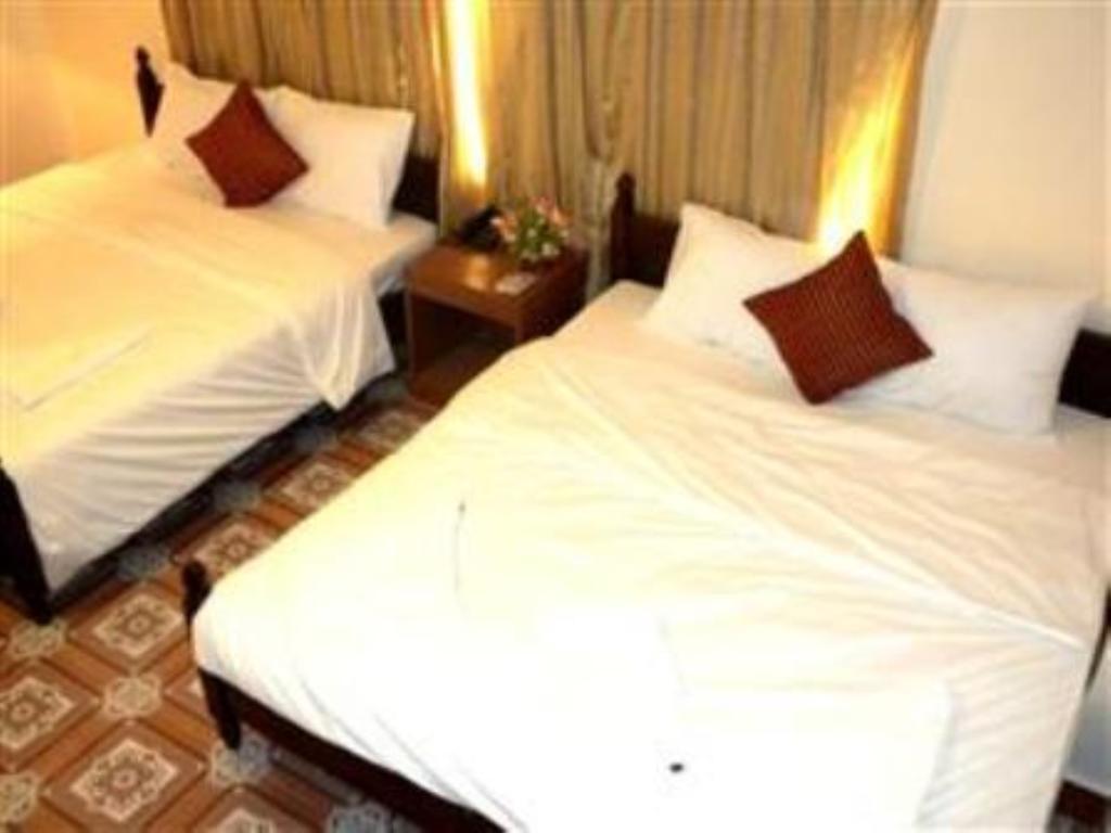 فندق Rendezvous بنوم بنه الغرفة الصورة