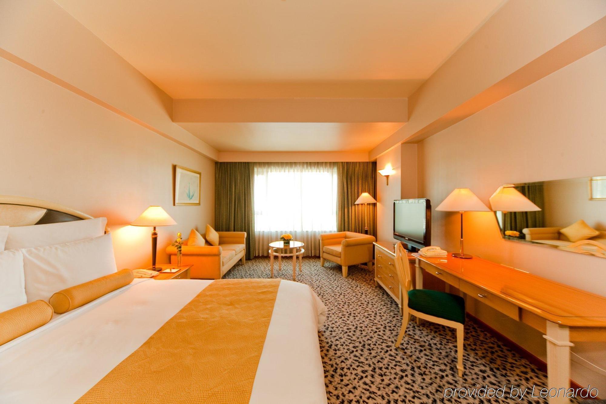 فندق فندق نيو وورلد ماكاتي، مانيلا الغرفة الصورة