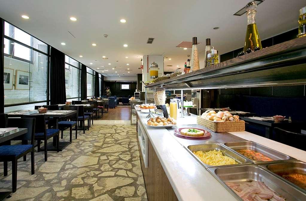 فندق مدريدفي  بيتيت بالاس كليبير-غران فيا المطعم الصورة