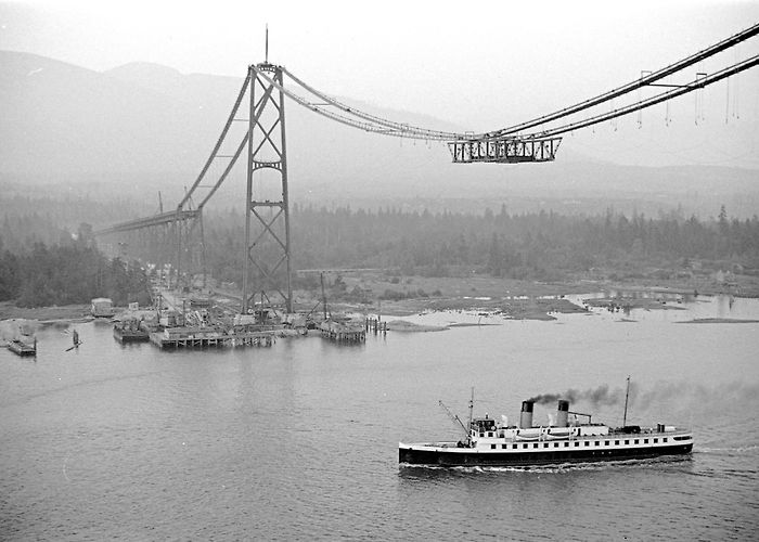 Lion Gate Bridge 80 years ago people walked across the Lions Gate Bridge for the ... photo