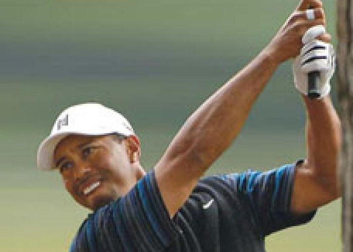 Golf Club Soltau Tiger Tips: Hold it off | How To | Golf Digest photo