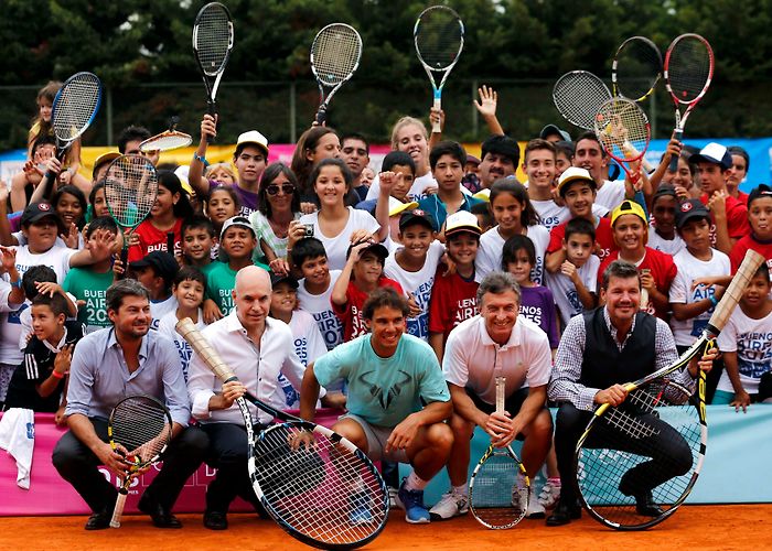 San Lorenzo de Almagro Sports Club Spain's Rafael Nadal poses for a picture with children during a ... photo
