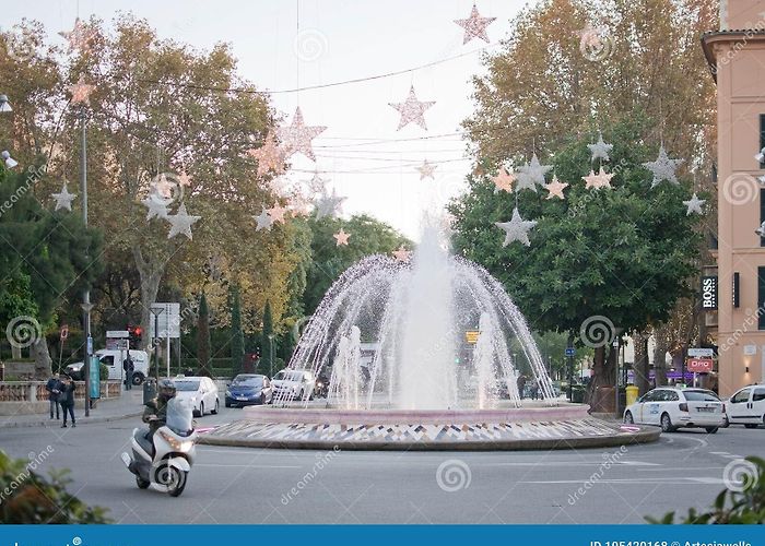Placa de la Reina Plaza De La Reina Fountain with Christmas Light Decorations ... photo