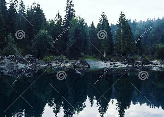 Lake Cauma Reflection of Clear Swiss Alpine Lake Caumasee Lag La Cauma Lai Da ... photo