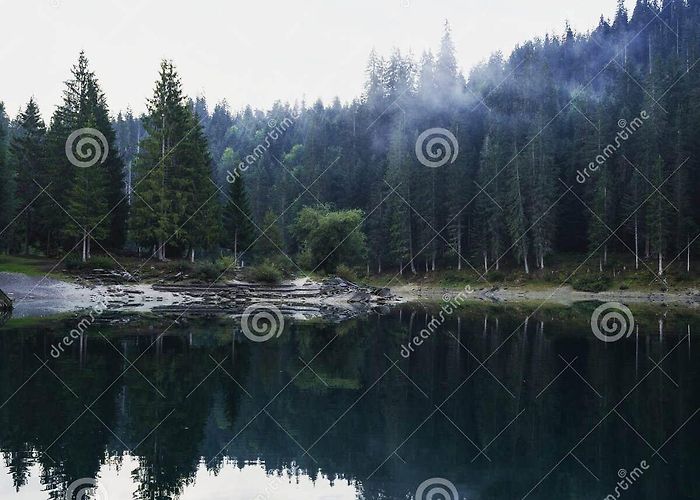 Lake Cauma Reflection of Clear Swiss Alpine Lake Caumasee Lag La Cauma Lai Da ... photo