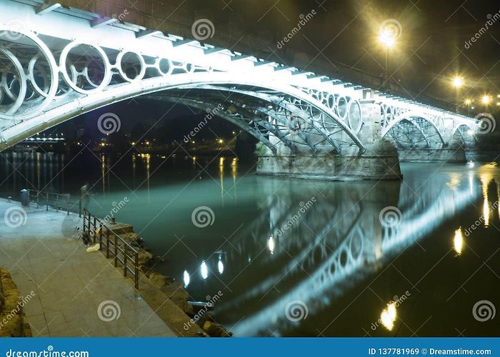 Triana Bridge - Isabel II Bridge Bridge of Triana and Isabel II of Seville - Puente De Triana E ... photo