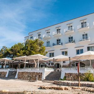 فندق Hostal Xuroy Cala Alcaufar Exterior photo